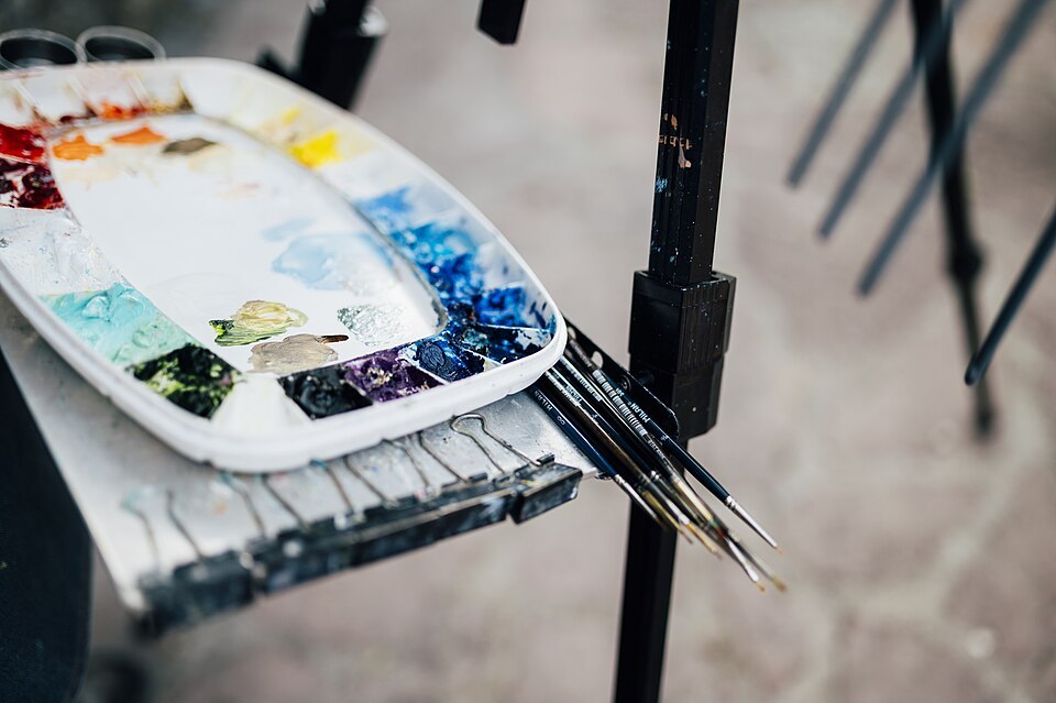 Paints and brushes ready for a creative session